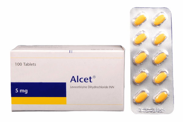Alcet 5 mg packaging with tablets on a gray background