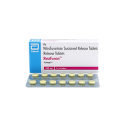 Box of Rezfuran Nitrofurantoin sustained release tablets with blister pack on a white background
