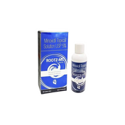 Minoxidil topical solution packaging with box and bottle on a white background