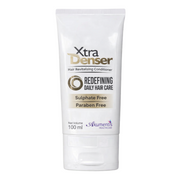 Xtra Denser hair conditioner tube on a white background